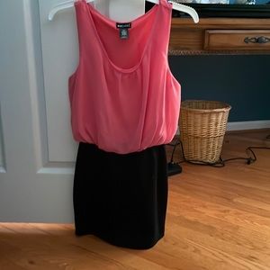 Fitted bottom with loose pink top dress.